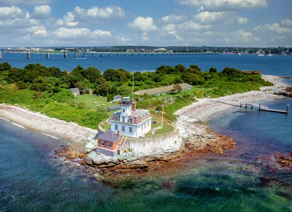 Aerial view of Rose Island Lighthouse on its small island in Narragansett Bay near Newport, Rhode Island.