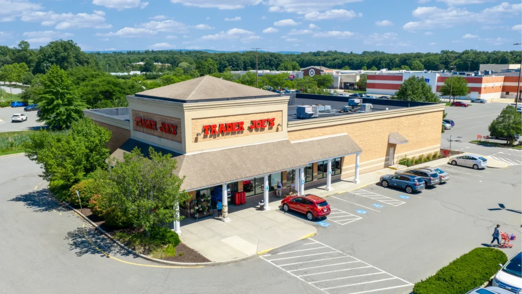 Aerial view of the Trader Joe's storefront and parking area at Hampshire Mall in Hadley, Massachusetts.